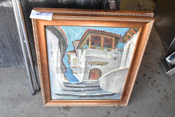Two framed pictures featuring architectural scenes, in good condition, with ornate wooden frames. Auction tag visible.