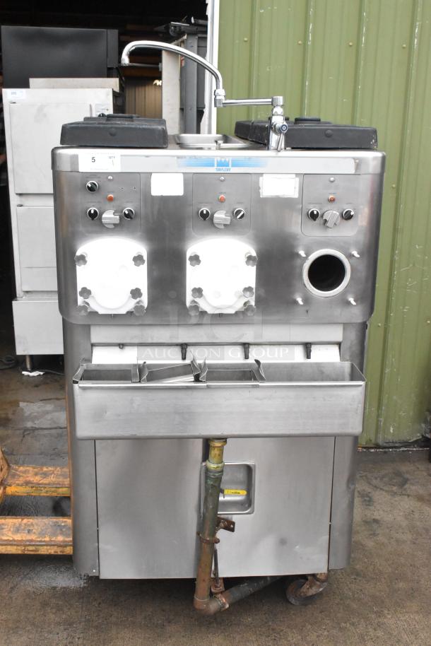 2016 Taylor C043-33 stainless steel frozen custard machine, 3 flavor, water-cooled, 3 phase, on commercial casters.