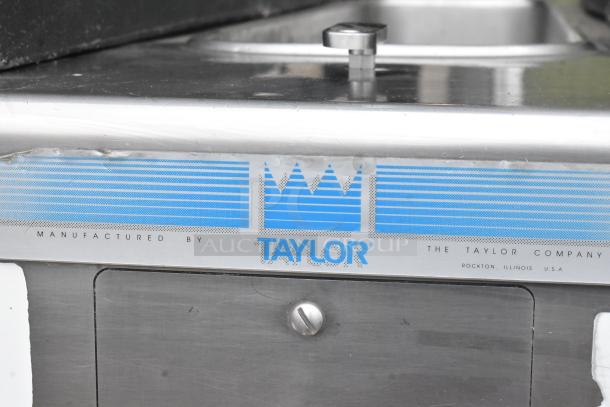 2016 Taylor C043-33 stainless steel frozen custard machine, 3-flavor, continuous dispensing, on casters, water-cooled.
