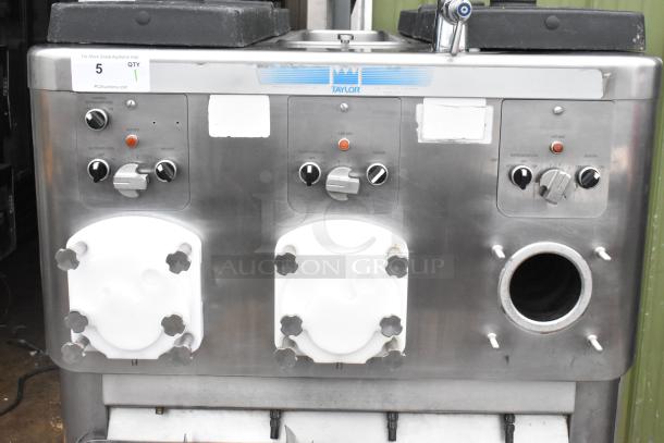 2016 Taylor C043-33 stainless steel commercial floor water-cooled 3-flavor frozen custard machine with controls, on casters.
