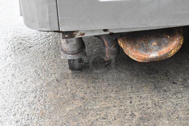 2016 Taylor C043-33 custard machine casters, showing signs of rust, suitable for commercial use, 208/230V, 3-phase.