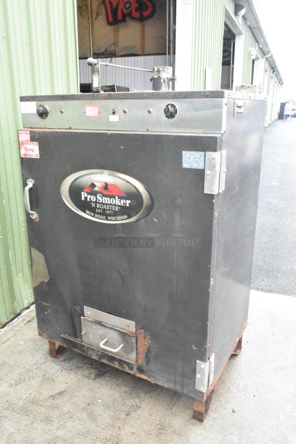 Pro Smoker 'N' Roaster 150P commercial smoker, 120/240V, 1 phase, visible wear, steel exterior, branded logo on front.