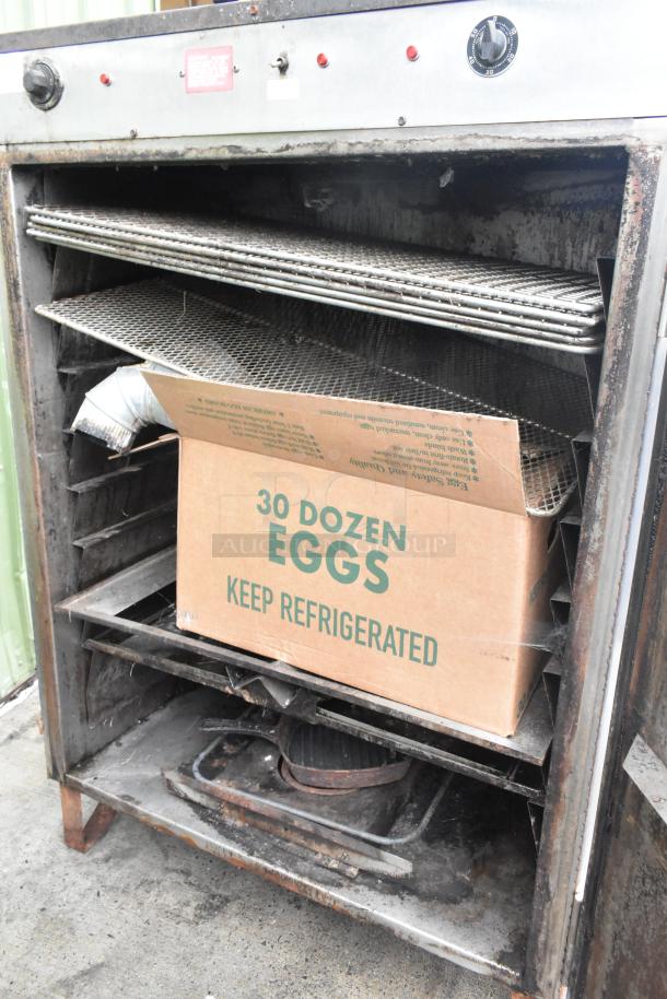 Pro Smoker 'N' Roaster 150P commercial smoker with 120/240V, 1-phase power, internal racks, and control panel. Used condition.