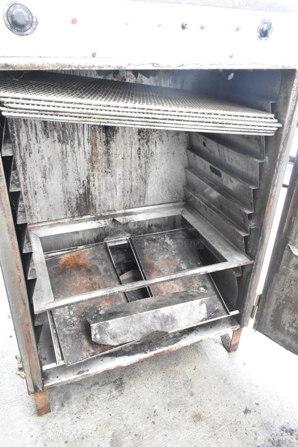 Pro Smoker 'N' Roaster 150P commercial smoker, interior view. Moderate wear, 120/240V, 1-phase. Durable metal construction.