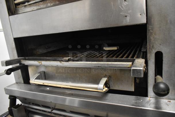 Montague Vectaire commercial gas-powered vertical broiler, stainless steel, with grill surface, in used condition.