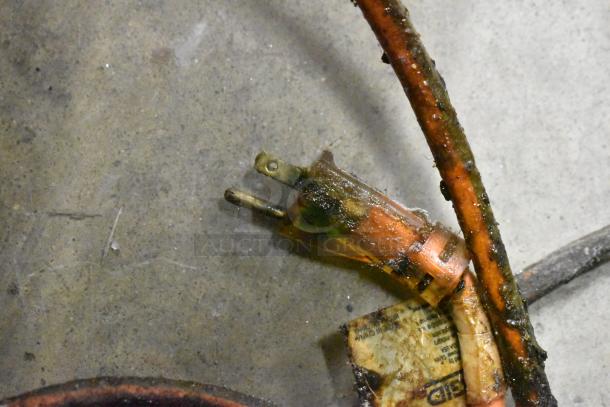 Montague Vectaire commercial gas broiler showing a dirty and damaged power cord with visible corrosion and wear.