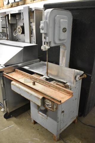 Hobart Commercial Floor Style Meat Saw, gray metal, used condition with signs of wear, visible control panel.