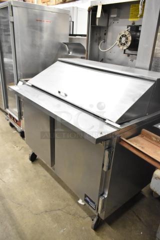 Beverage Air SPE48-18M commercial sandwich salad prep table, stainless steel, on casters, 115 volts, excellent condition.