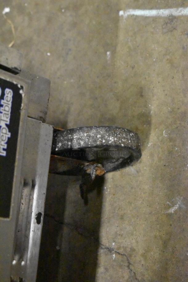 Beverage Air SPE48-18M commercial sandwich salad prep table caster, evidence of wear, 115V, 1 phase, durable, mobile.