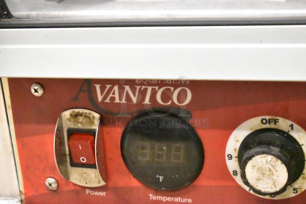 Avantco 177HPI1836 heated holding cabinet control panel with power switch and temperature dial. Visible wear on dials.