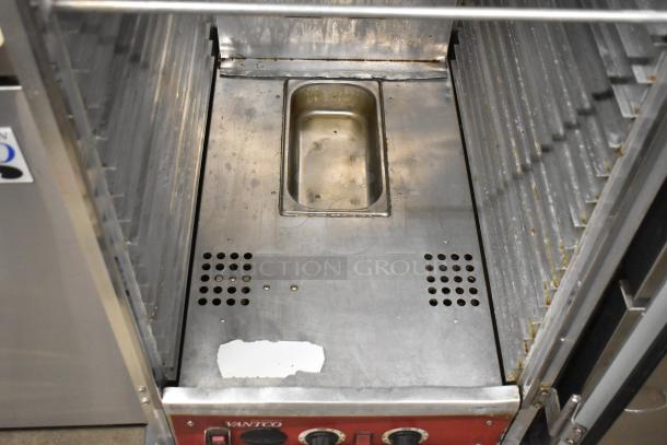 Avantco 177HPI1836 Commercial Heated Holding Cabinet, 120V, on casters, interior view showing trays and controls, used condition.
