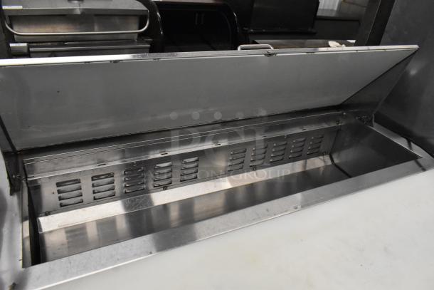 Avantco 178APT48HC commercial sandwich salad prep table with mega top, bain marie feature, on casters, 115V, 1 phase.