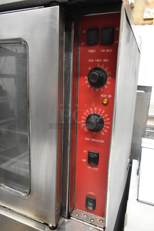 Cooking Performance Group convection oven model 351FGC100N, red control panel, view-through doors, on casters, 54,000 BTU.