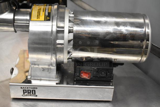 Backyard Pro 554BSG12 Electric Meat Grinder, stainless steel, power switch visible, branding on base, used condition.