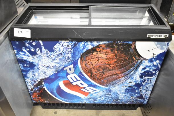 Beverage Air EZA84 chest freezer merchandiser, 115 volts, 1 phase, featuring Pepsi branding, and visible product number tag.