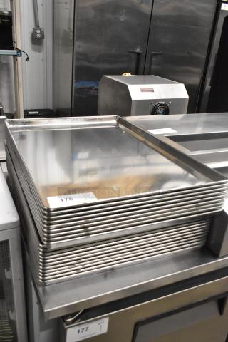 Stack of 20 metal full-size baking pans in excellent condition. Tags indicate quantity "20" and item number "176".