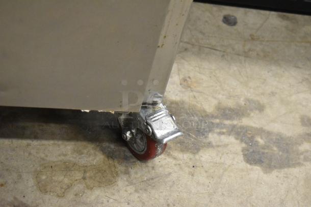 Cooltech CTR-48LBB 2 Door Undercounter Cooler on commercial casters, visible caster detail. 115V, 1 Phase.