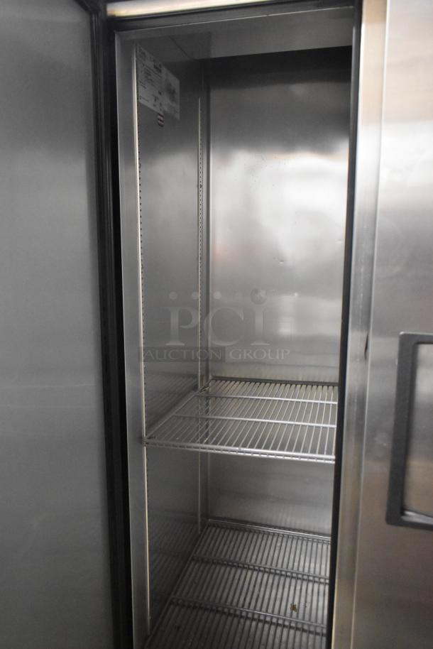2016 True T-35 2-door reach-in cooler in stainless steel, on commercial casters. 115 Volts, 1 Phase. Interior shelving visible.