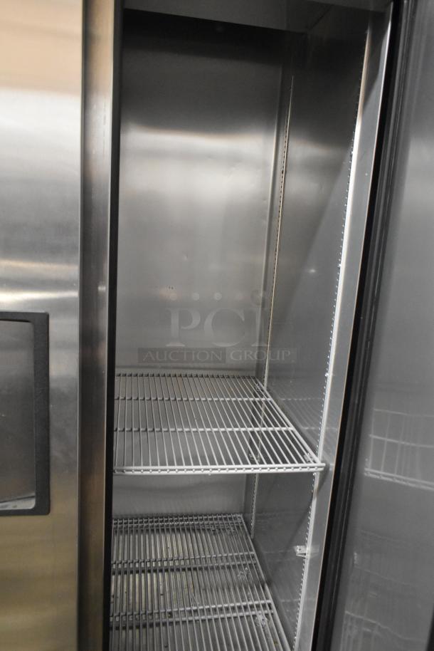 2016 True T-35 Commercial 2 Door Reach In Cooler with shelves, stainless steel interior, on casters, 115V, 1 phase.