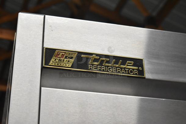 True T-35 commercial 2-door reach-in cooler, stainless steel, 115 volts, 1 phase, True Manufacturing label visible.