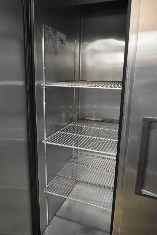 True T-35 Commercial 2 Door Reach-In Cooler, 115 Volts, 1 Phase. Features stainless steel interior with adjustable shelves.