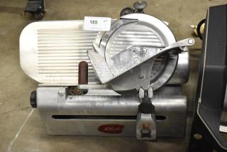 Globe commercial countertop meat slicer with blade sharpener; 115 volts, 1 phase; visible Globe logo; used condition.