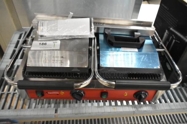 Brand new 2025 Avantco 177PG400 commercial dual panini grill with grooved plates, 19 5/8" x 9 1/8" surface. 120V.