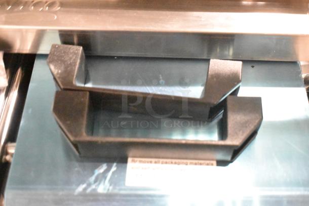 Avantco 177PG400 Commercial Dual Panini Grill, brand new scratch and dent, grooved plates, 19 5/8" x 9 1/8" surface.