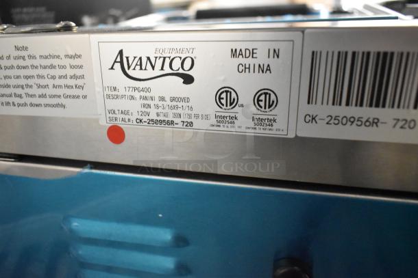 Brand new Avantco 177PG400 commercial dual panini grill, scratch and dent, with grooved plates, 120V, 19 5/8" x 9 1/8".