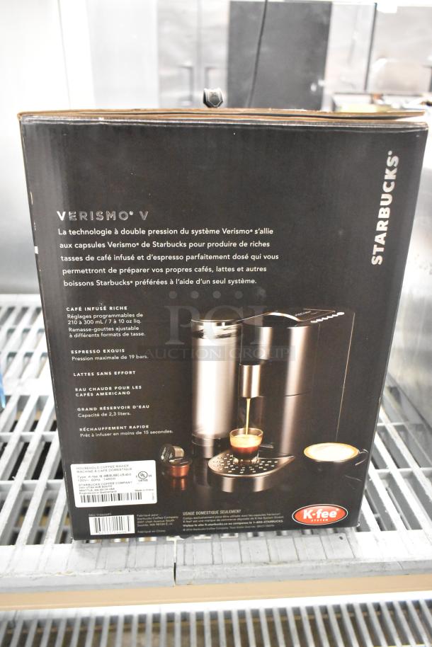 IN ORIGINAL BOX! Verismo K-fee Household Coffee Maker, 120V, 1 Phase. Includes Starbucks branding and features.