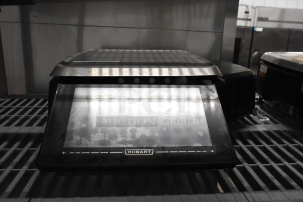 2016 Hobart HTi-LH commercial countertop scale, missing power cord, 120/208-240 volts, 1 phase, front view on shelf.