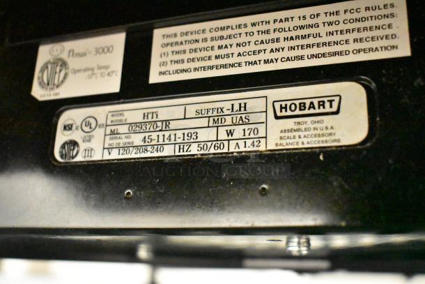 2016 Hobart HTi-LH commercial countertop scale label. Model: 029370-IR, Serial No: 45-1141-193, 120/208-240V, missing power cord.
