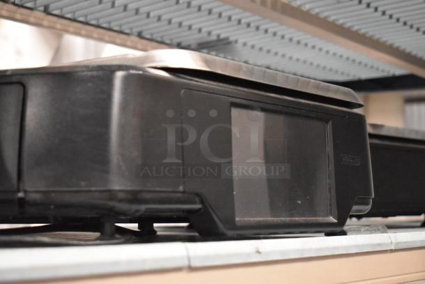 2017 Hobart HTi-7LH26 commercial countertop scale, black, tested and working, 120/208-240 volts, 1 phase.