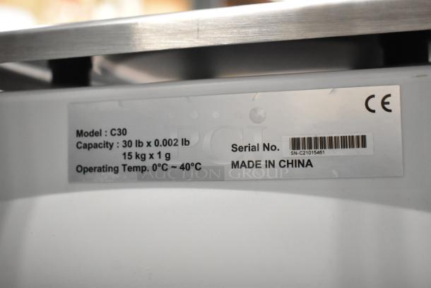 Cardinal C30 scale, 30 lb capacity, CE marked, model C30, operating temp 0-40°C, made in China, serial SN-C21015461.