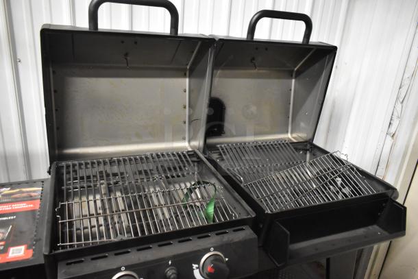 Char-Griller Professional Propane Gas Grill with dual compartments, stainless steel grates, and control knobs, in used condition.