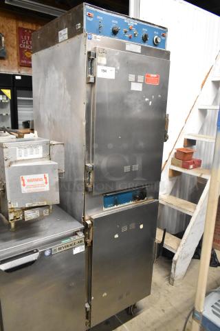 Alto Shaam 1000-TH commercial oven on casters. Top door does not open. Operates at 208/240 volts.
