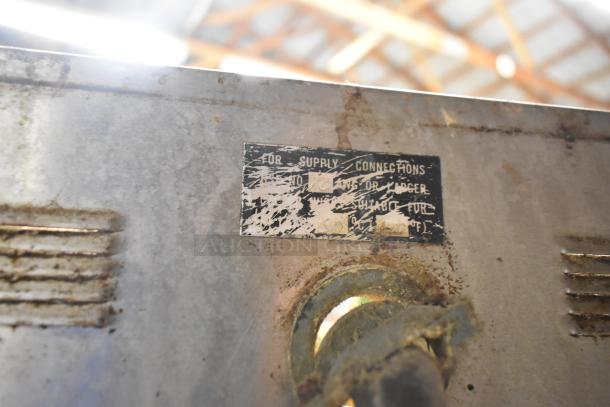 Alto Shaam 1000-TH commercial oven showing a worn supply connections label. Top door non-functional, 208/240 volts.