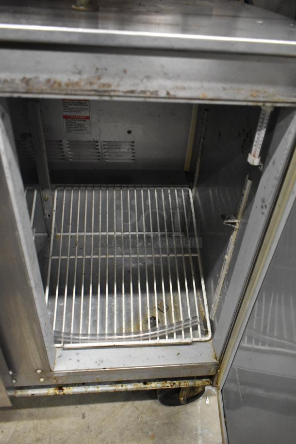 Beverage Air UCR36A commercial undercounter cooler with two doors, on casters. Shows signs of wear. 115V, 1 phase.