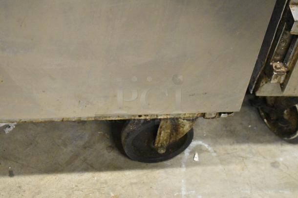 Beverage Air UCR36A commercial undercounter cooler, two doors, on rusted casters, 115 volts, 1 phase.