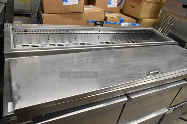 Continental CPA60 Commercial Pizza Prep Table with 2 drawers, 2 doors, on casters. Stainless steel finish, 115V, 1 phase.
