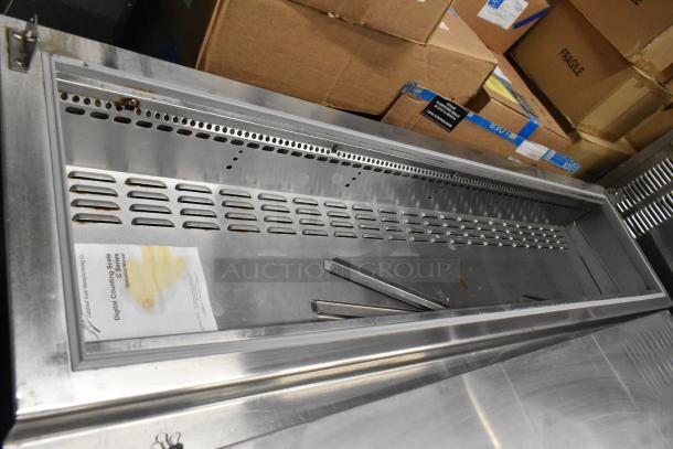 Continental CPA60 commercial pizza prep table with 2 drawers, 2 doors, and commercial casters, shown in stainless steel.