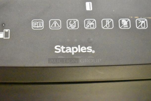 Staples ST62157 Micro-Cut Shredder, 120V, 1 Phase. Features control icons, brand logo visible, used condition.