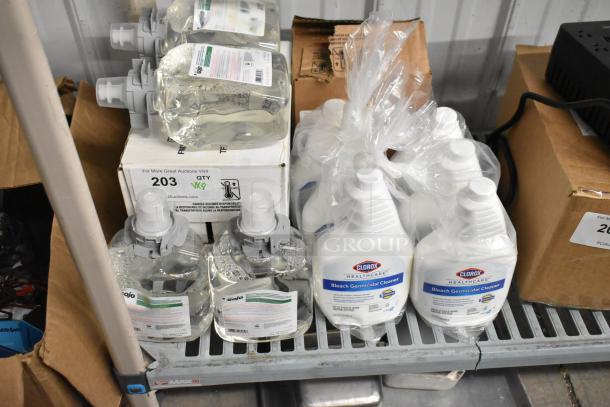 8 various cleaning items, including GoJo Green Certified Foam Hand Cleaner and Clorox Bleach Germicide Cleaner, packaged for auction.