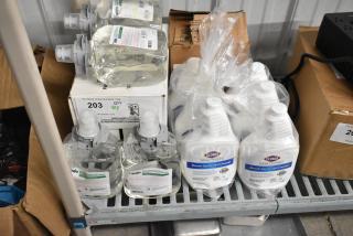 8 various cleaning items, including GoJo Green Certified Foam Hand Cleaner and Clorox Bleach Germicide Cleaner, packaged for auction.