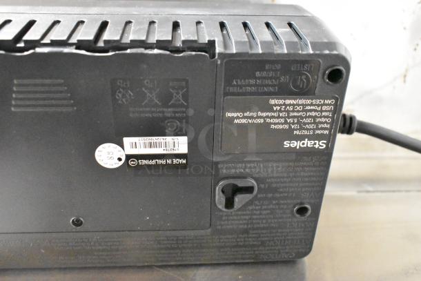 Staples uninterruptible power supply, model 51766, visible labels, made in Philippines, includes serial number.