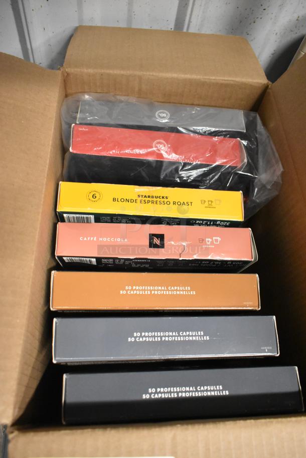 Box of Nespresso coffee capsules, various flavors, including Starbucks Blonde Espresso Roast. New condition with packaging.