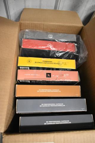 Box of Nespresso coffee capsules, various flavors, including Starbucks Blonde Espresso Roast. New condition with packaging.
