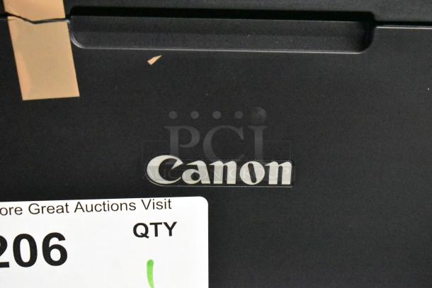 Canon countertop printer scanner copier machine, 120V, 1 phase, close-up of brand logo with auction tag partially visible.