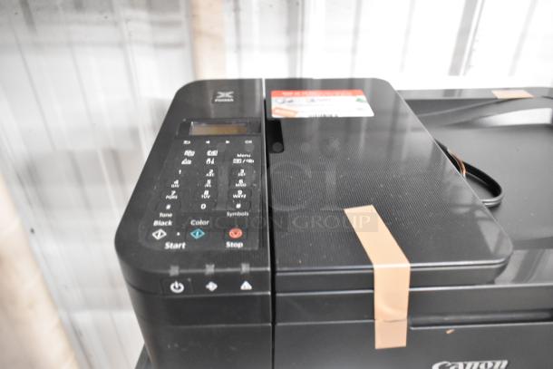 Canon countertop printer scanner copier, 120 volts, 1 phase. Features keypad, start/stop buttons, and display screen.