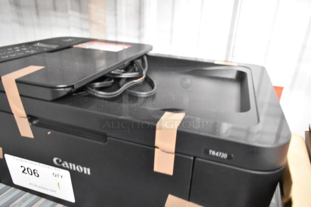 Canon countertop printer scanner copier, model TR4720, in good condition with visible cables. Voltage: 120V, 1 phase.